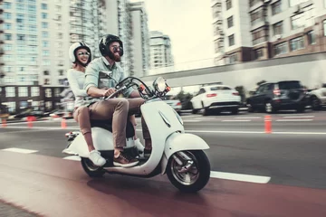 Foto op Plexiglas Couple on scooter © georgerudy