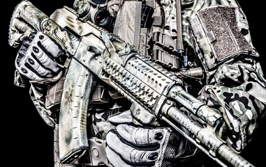 Close-up shot of Kalashnikov rifle automatic weapons in hands of army special forces soldier...