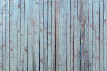 Fototapeta na wymiar Old blue wooden vertical stripes background