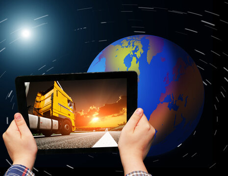 Truck on the tablet shipping carge