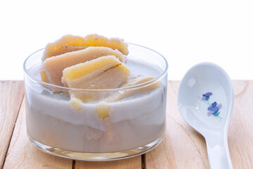 Banana Cooked in Coconut Milk (Kluay Buat Chi),Thai desserts made from banana and coconut milk.Sweet taste, it mellow.