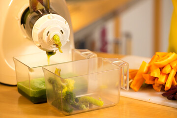 Make vegetables juice in juicer machine
