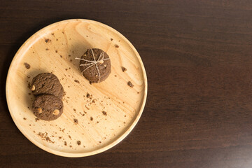 chocolate chip cookies on wood background