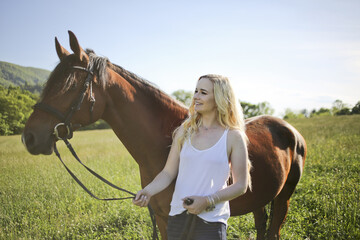 Blonde Female with a Horse in Rural Virginia