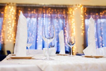 Served table in restaurant, bokeh on background