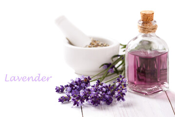 Fototapeta na wymiar essential oil and lavender flowers