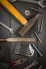 Joinery tools on a dark wooden table. Place for the text. A concept for Father's Day.