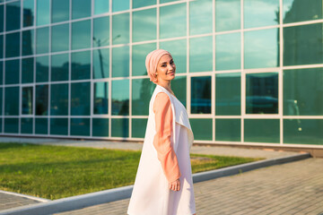 Portrait of young beautiful Asian muslim woman wearing hijab.