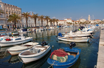 Fototapeta na wymiar Split City, boats in Harbor and the Diocletian Palace in the background