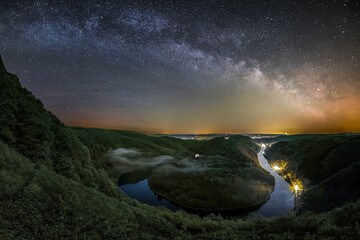 The Milky Way over the Saar Loop as seen from the viewpoint Cloef at Orscholz near Mettlach in Germany.