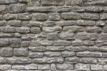 Old grey brick wall texture background. Abstract texture for designers