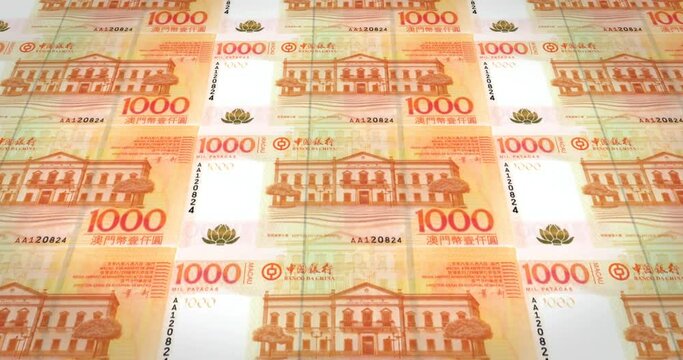 Banknotes of one thousand macanese patacas of Macau rolling, cash money, loop