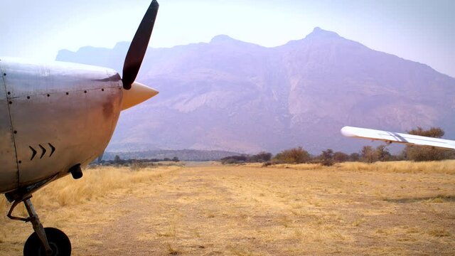 Takeoff of an airplane in the desert