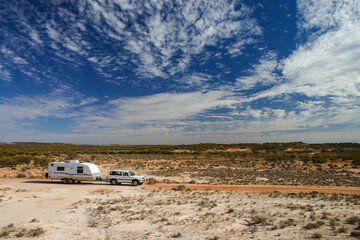 Fototapeta na wymiar Four Wheel Drive and off road Caravan in the Outback of Western Australia