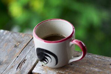 Coffee mug with green background