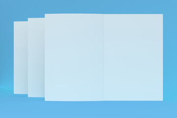 Three blank white open brochure mock-up on blue background
