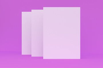 Three blank white closed brochure mock-up on violet background