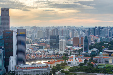 Fototapeta na wymiar Top views skyline business building and financial district in sunset time at Singapore City, Singapore