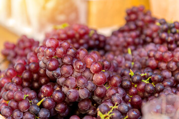 Fresh Red wine grapes or dark grapes at the fruit market