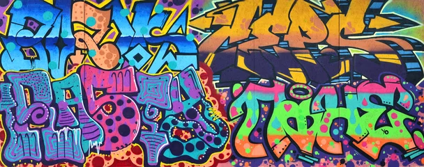 Photo sur Plexiglas Graffiti Art sous terre. Beau style de graffiti d& 39 art de rue. Le mur est décoré avec de la peinture de maison de dessins abstraits. Culture urbaine emblématique moderne des jeunes de la rue. Photo élégante abstraite sur le mur