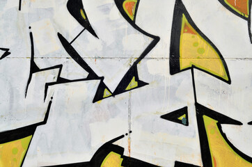 Art under ground. Beautiful street art graffiti style. The wall is decorated with abstract drawings house paint. Modern iconic urban culture of street youth. Abstract stylish picture on wall