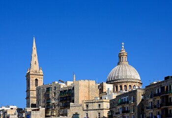 View of St Pauls Anglican Cathedral and the Basilica of Our Lady of Mount Carmel, Valletta, Malta.