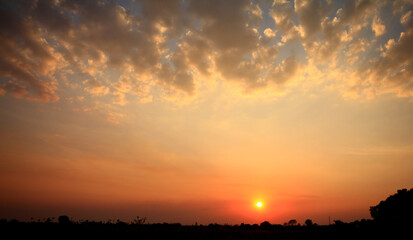 The sunset background.