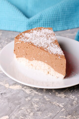 Three chocolate mousse cake slice on a small plate