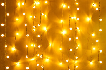 Blurred retro light bulb decor glowing for abstract background. Holiday or party background.