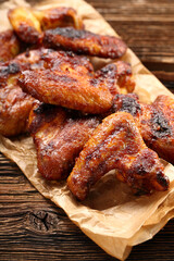 Chicken wings baked wings on wooden background