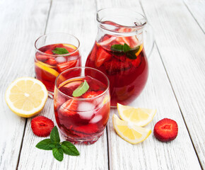 Glasses of lemonade with strawberries