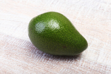 Fresh, green Avocado isolated on a white background.