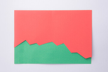 Red business graphic isolated over green background.