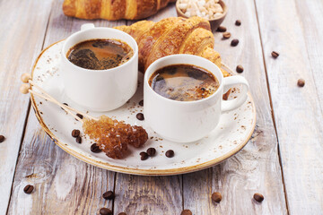 Coffee and croissants breakfas