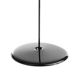Pouring oil on white background