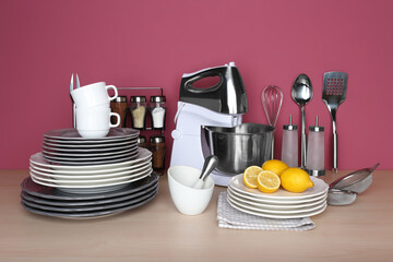 Kitchen utensils and cookware for cooking classes on wooden table