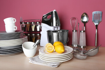 Kitchen utensils and cookware for cooking classes on wooden table