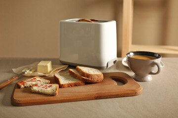 Composition with butter coffee and toasts on kitchen table