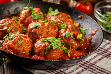 Pork meatballs with spicy tomato sauce - 157373246