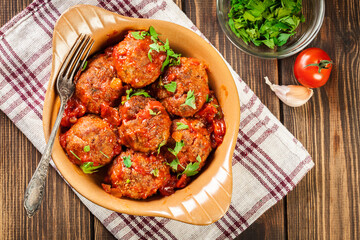 Pork meatballs with spicy tomato sauce in dish