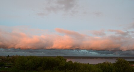 Fototapeta na wymiar Dramatic sunset above Volga river in Russia