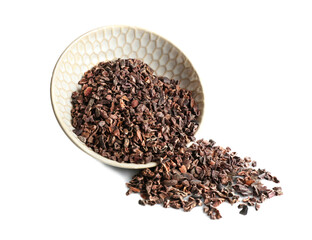 Bowl with cocoa nibs on white background