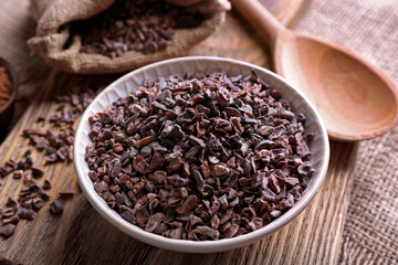 Composition with cocoa nibs on table