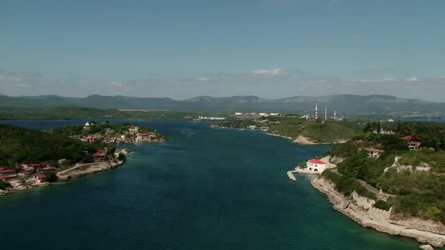 Pan across of the Bay of Santiago de Cuba. Sierra Maestra mountain range on the background. Taken from San Pedro de la Roca Castle