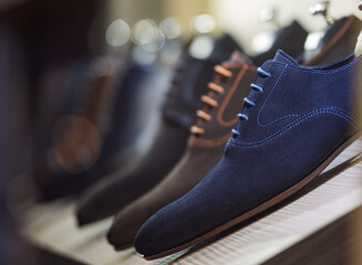 Elegant men shoes in a store in Paris