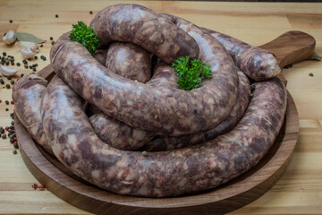 Rustic sausage from liver, fat, rustic cheese and pepper in sausage intestine