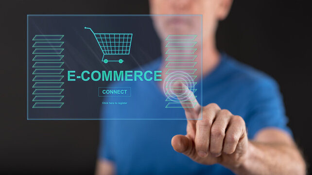 Man Touching An E-commerce Concept On A Touch Screen