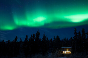 Taiga home under Northern Lights Aurora borealis