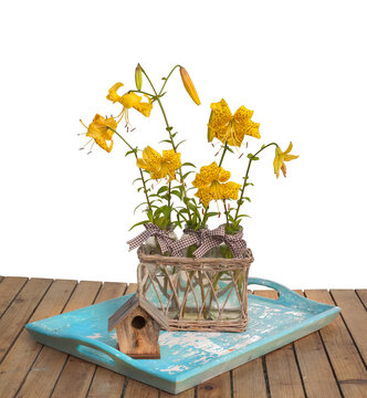 Bouquet of yellow lilies "Citronella" on a tray
