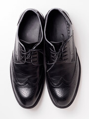 Black leather shoe pair
